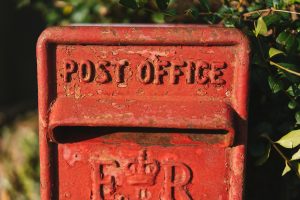 Rusty British square postbox