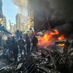 First responders stand amid rubble at the site of an Israeli airstrike in Beirut's Corniche al-Mazraa neighbourhood on April 8, 2026. Israel launched a series of strikes in Beirut on April 8, causing panic among residents in the most violent attack on the capital since the start of the war with Hezbollah. The Israeli military said it carried out its "largest coordinated strike across Lebanon". Israel has insisted the two-week truce in its war with Iran does not apply to Lebanon. (Photo by AFP via Getty Images)