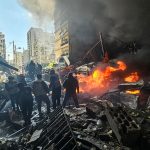 First responders stand amid rubble at the site of an Israeli airstrike in Beirut's Corniche al-Mazraa neighbourhood on April 8, 2026. Israel launched a series of strikes in Beirut on April 8, causing panic among residents in the most violent attack on the capital since the start of the war with Hezbollah. The Israeli military said it carried out its "largest coordinated strike across Lebanon". Israel has insisted the two-week truce in its war with Iran does not apply to Lebanon. (Photo by AFP via Getty Images)